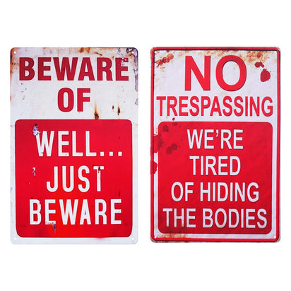 Retro Halloween Metal Sign – No Trespassing, We're Tired of Hiding the Bodies