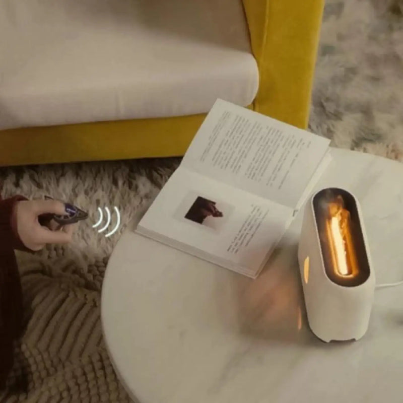 Small portable heater next to an open book on a table