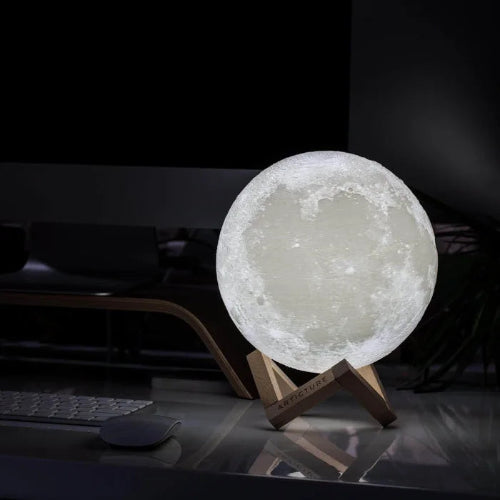 Moon lamp on a stand in a dark room 